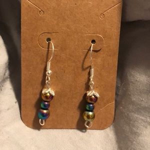 Multicolored mini beads with little flower topper.